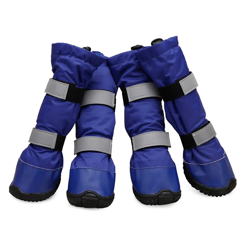 waterproof snowproof dog boots on snow surface